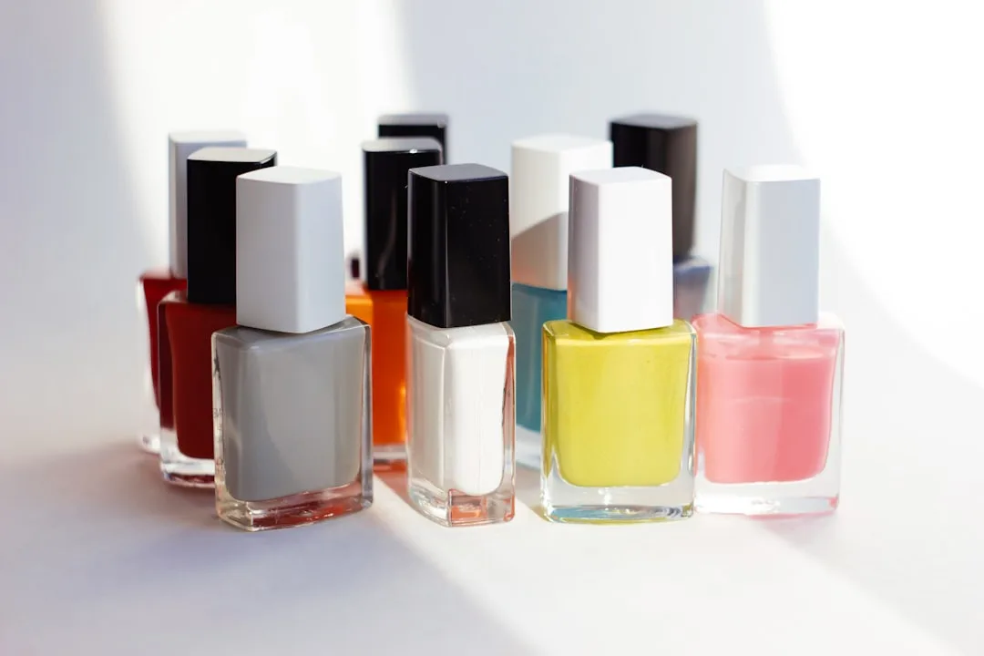 a group of different colored bottles